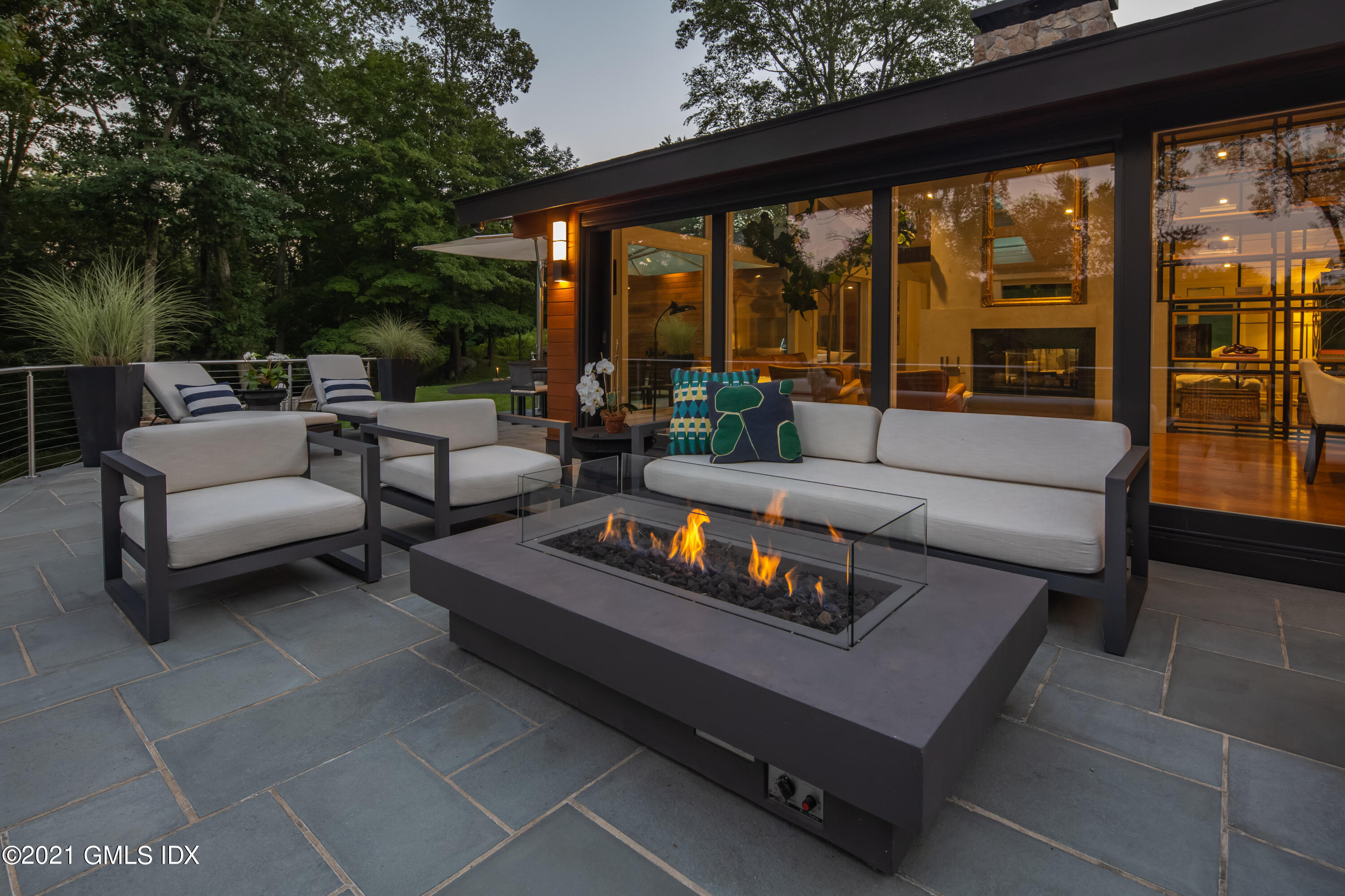 11 Old Forge Road Greenwich, CT 06830 - Photo 33 of 34 a outdoor living space with furniture and a floor to ceiling window