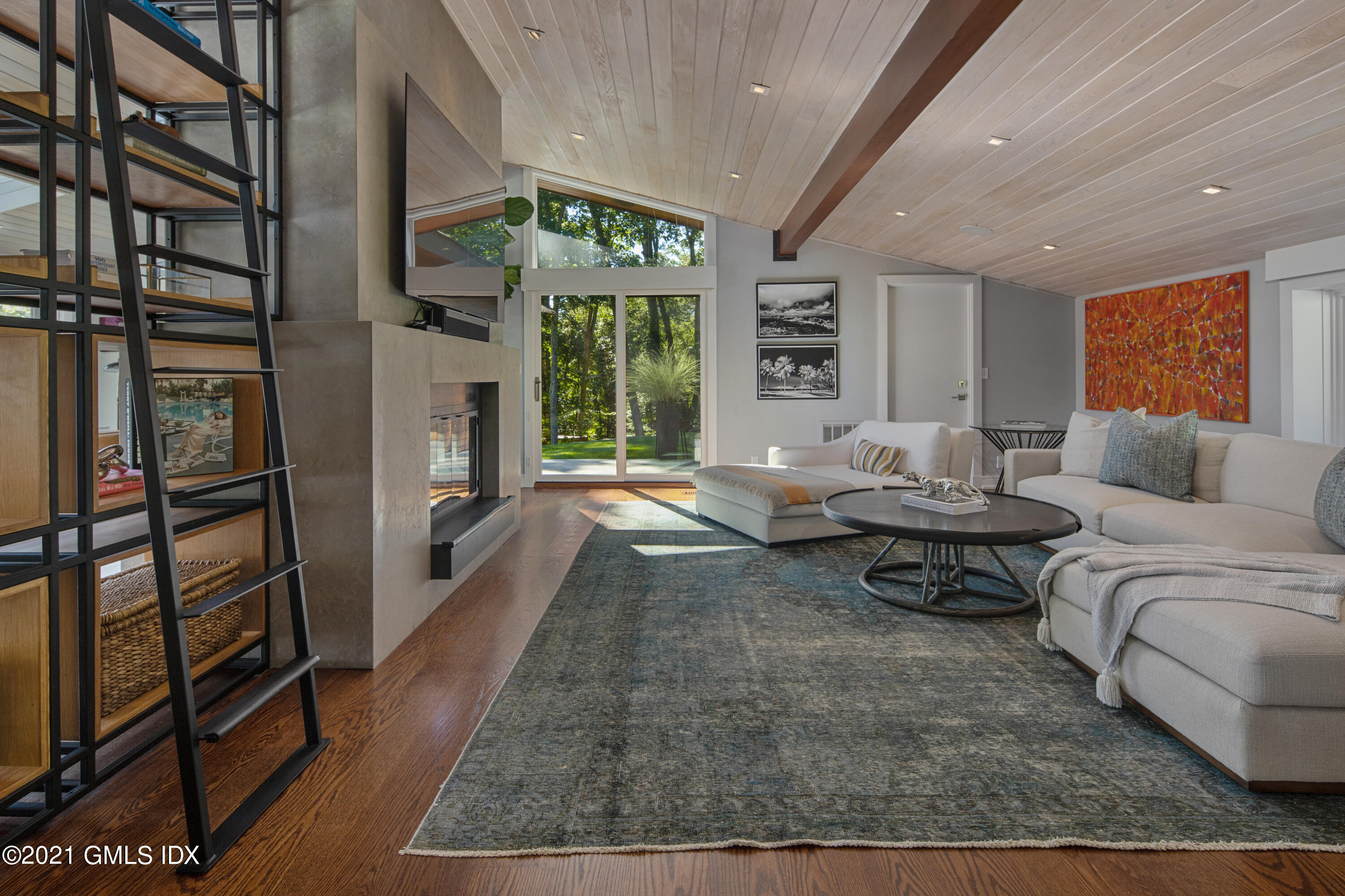 11 Old Forge Road Greenwich, CT 06830 - Photo 7 of 34 a living room with furniture and a rug