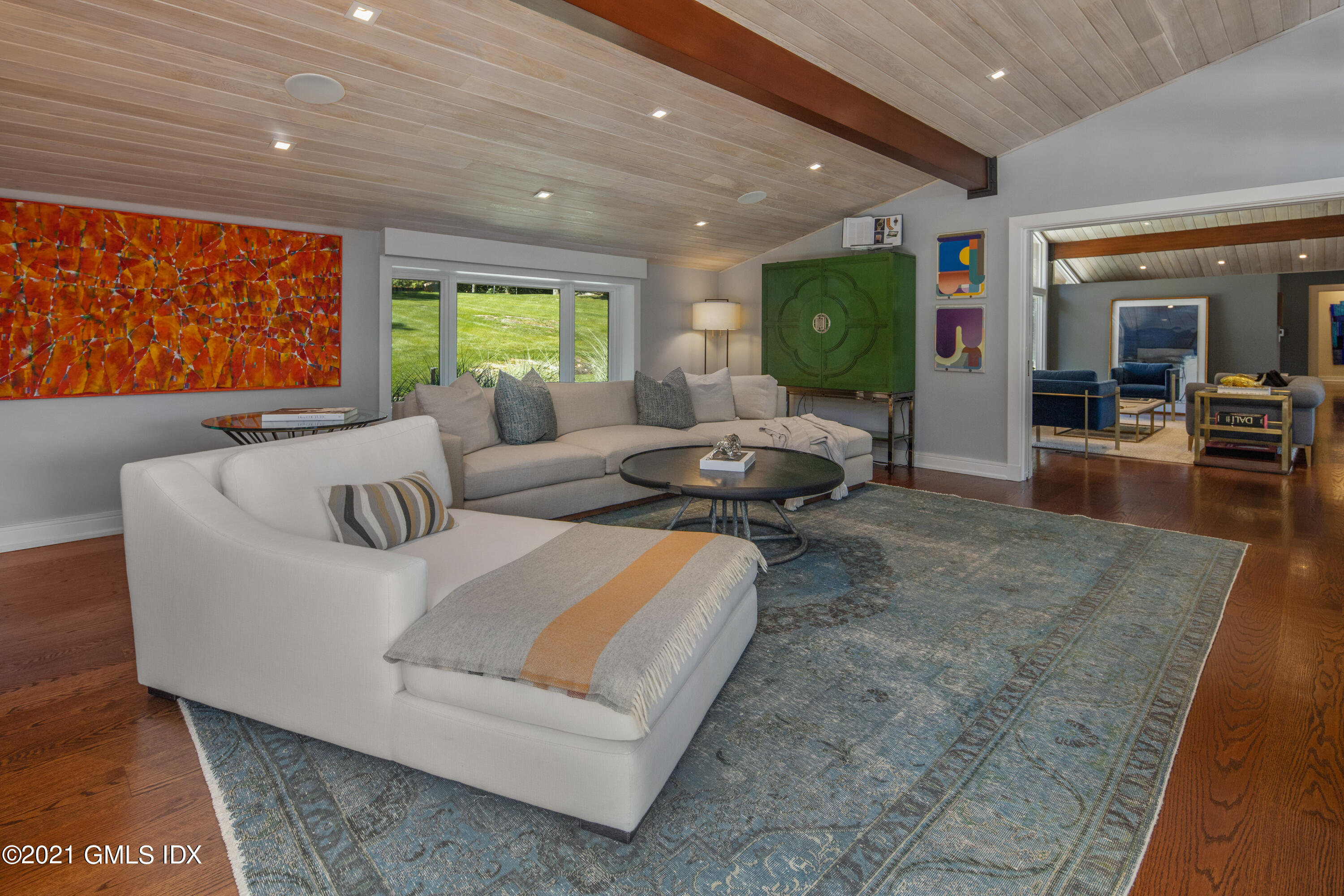 11 Old Forge Road Greenwich, CT 06830 - Photo 10 of 34 a living room with furniture floor to ceiling window and floor to ceiling window