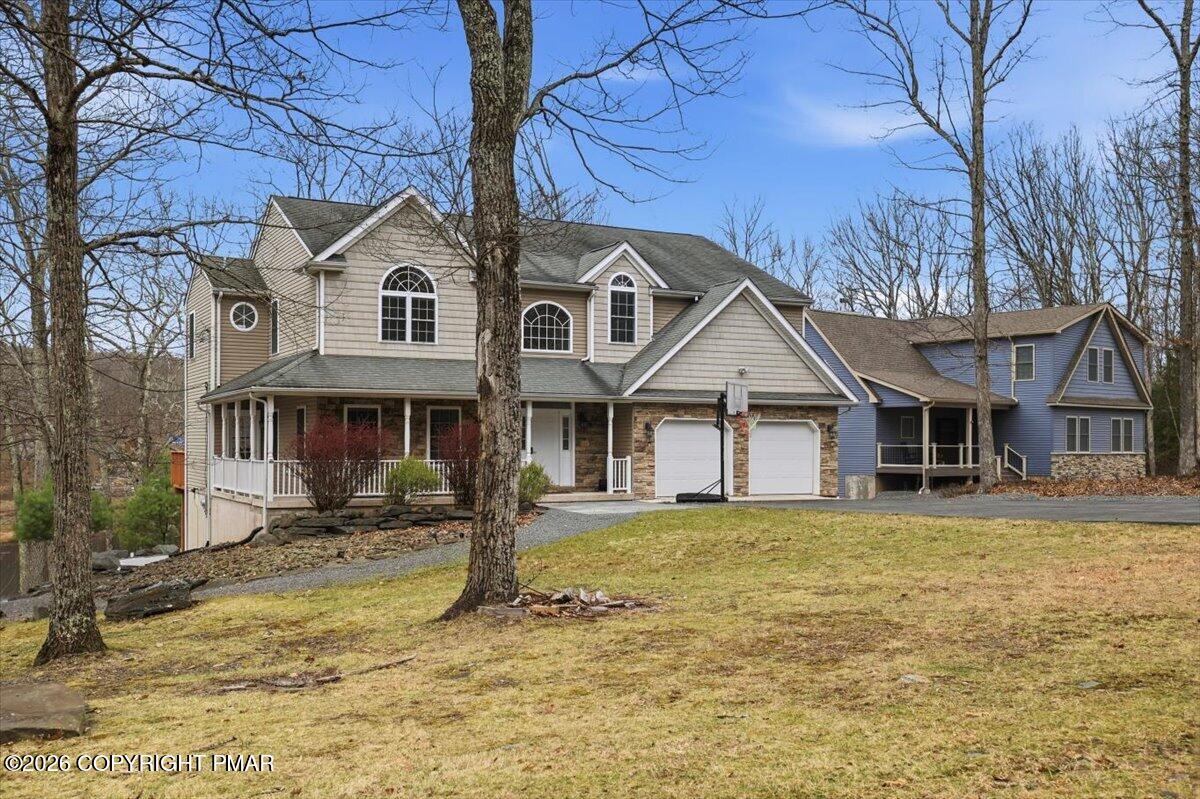 290 Lakeview Road Lackawaxen, PA 18435 - Photo 57 of 79 a front view of a house with a yard
