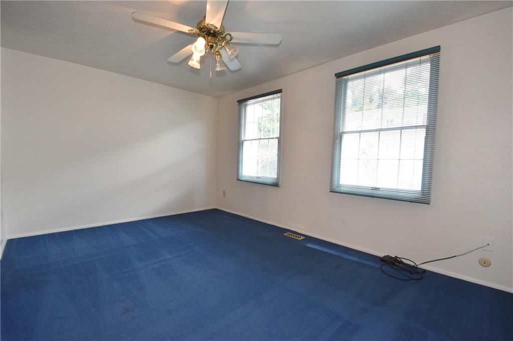 32 Shadow Drive Pittsburgh, PA 15227 - Photo 12 of 24 an empty room with windows and fan