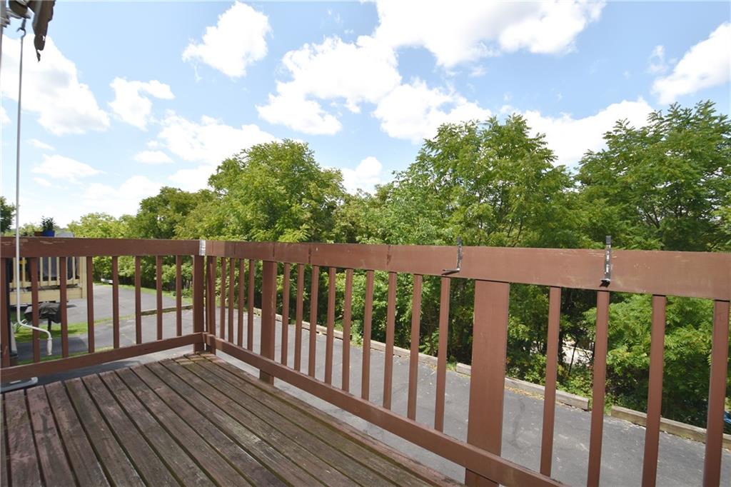 32 Shadow Drive Pittsburgh, PA 15227 - Photo 21 of 24 a balcony with wooden floor and fence