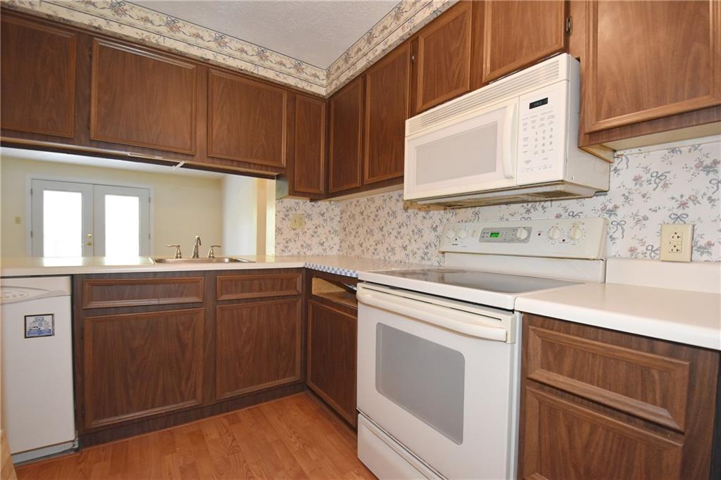 32 Shadow Drive Pittsburgh, PA 15227 - Photo 9 of 24 a kitchen with cabinets appliances a sink and a window