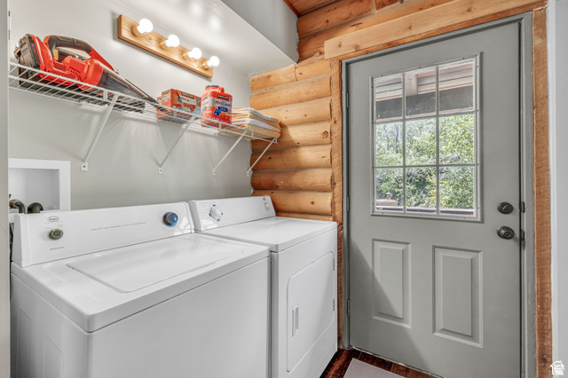 2348 North Miles Holw Road, Unit 26 Kamas, UT 84036 - Photo 20 of 31 Laundry area with washer and dryer and rustic walls
