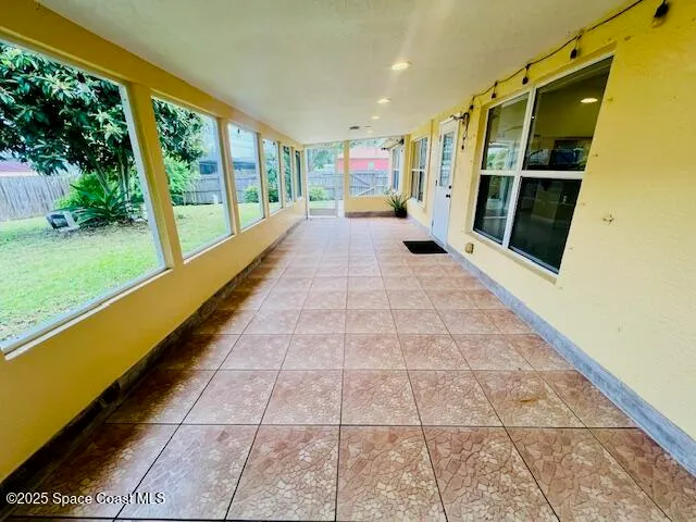 a hallway with a large window
