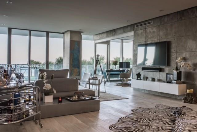 350 Ocean Drive, Unit 304N Key Biscayne, FL 33149 - Photo 20 of 69 Living area with open den with sliding door for privacy