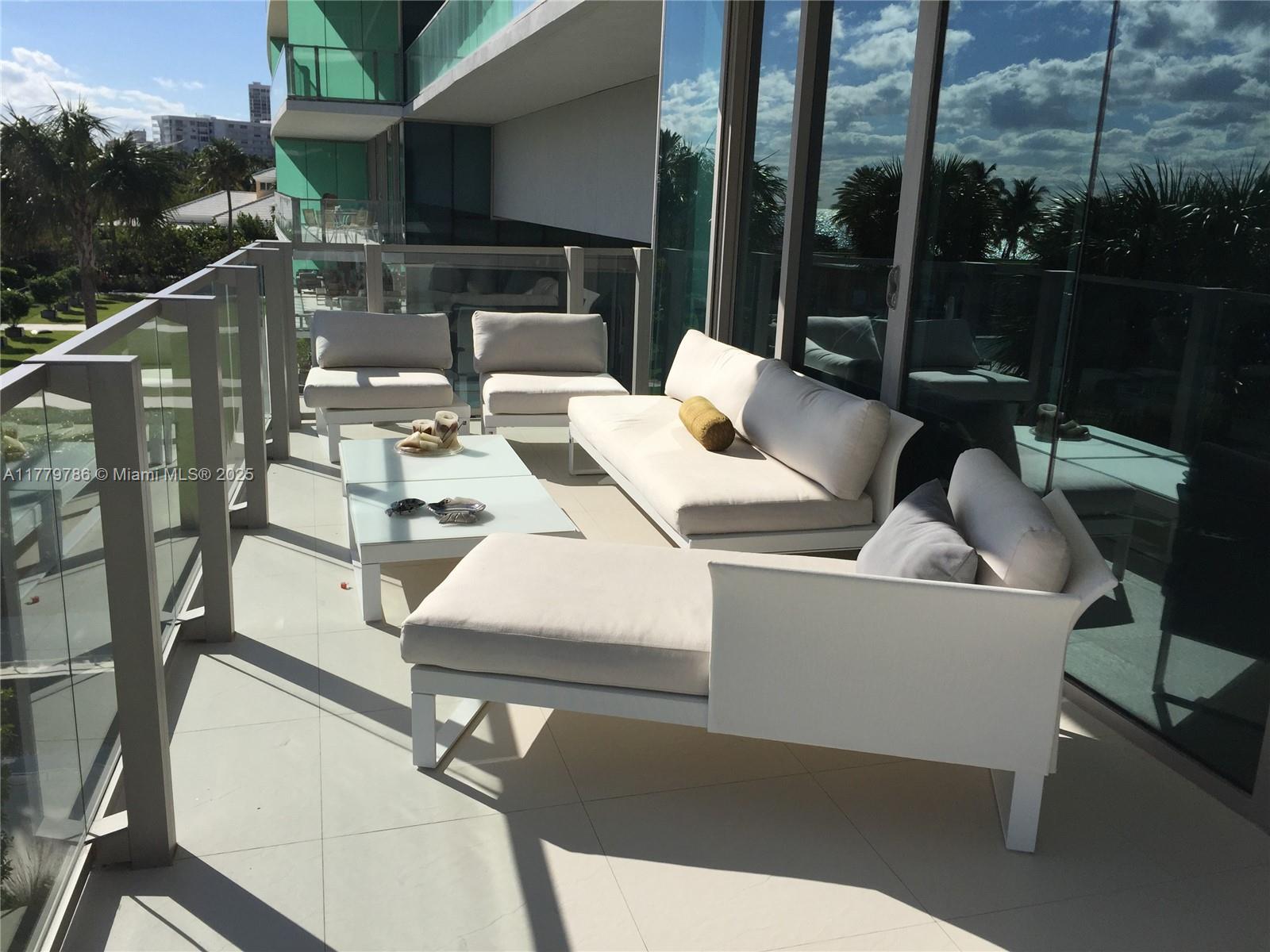 350 Ocean Drive, Unit 304N Key Biscayne, FL 33149 - Photo 33 of 69 Balcony with Sifa Furniture