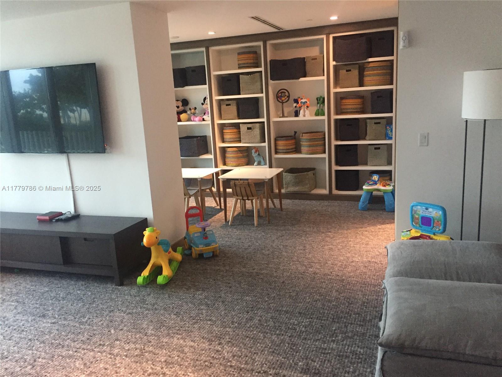 350 Ocean Drive, Unit 304N Key Biscayne, FL 33149 - Photo 47 of 69 Children's playroom North Tower with outside area