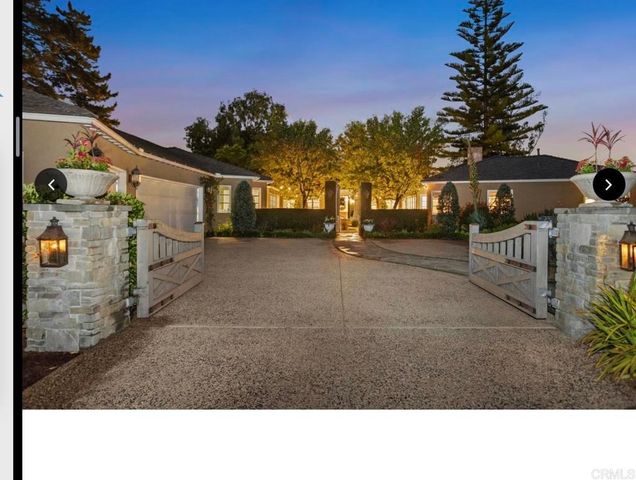 a black and white photo of a house