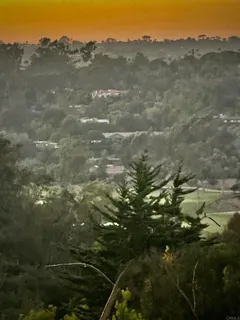 a view of a house with a mountain