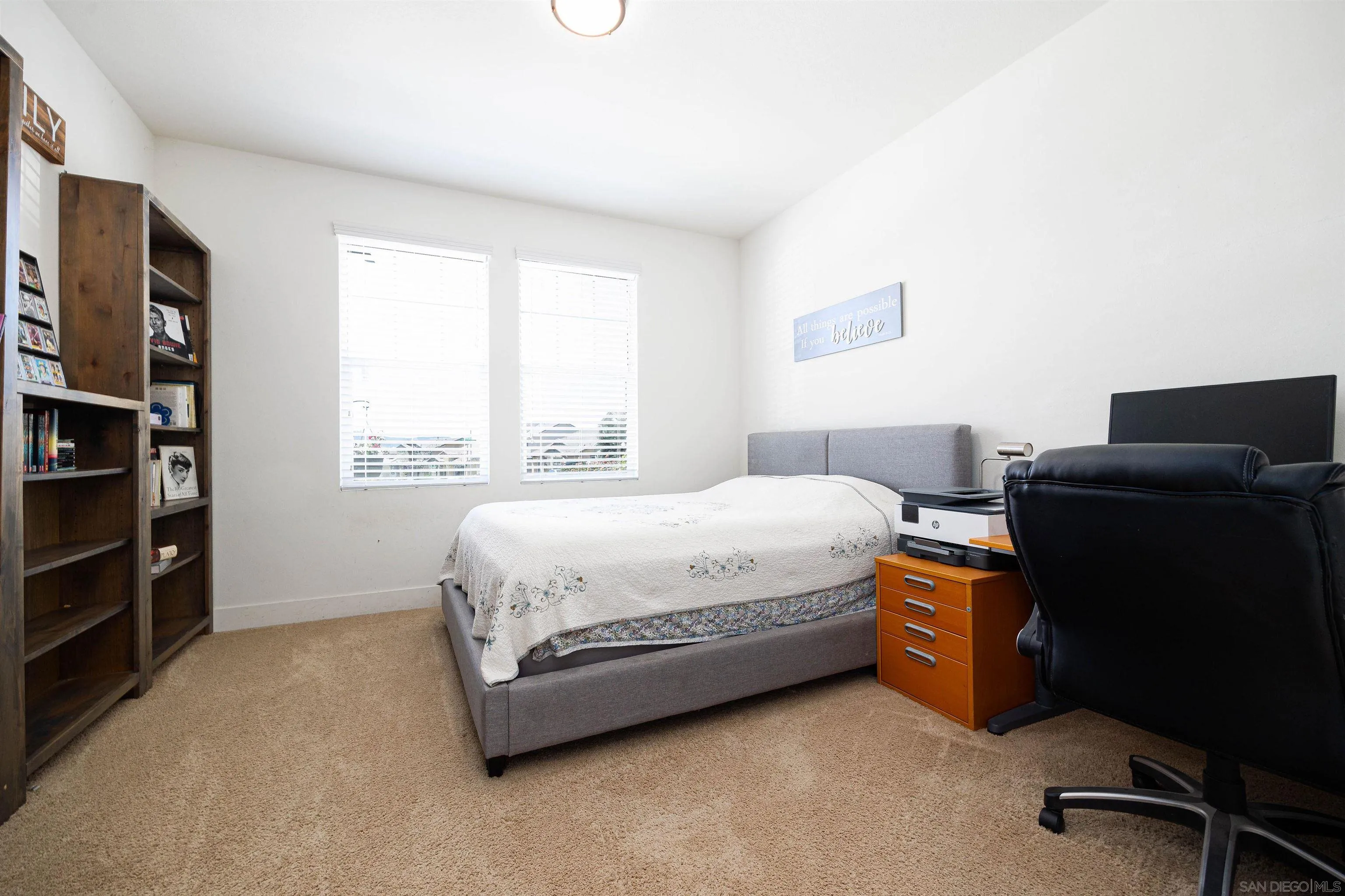 35763 Garrano Lane Fallbrook, CA 92028 - Photo 6 of 25 a spacious bedroom with a bed and a desk