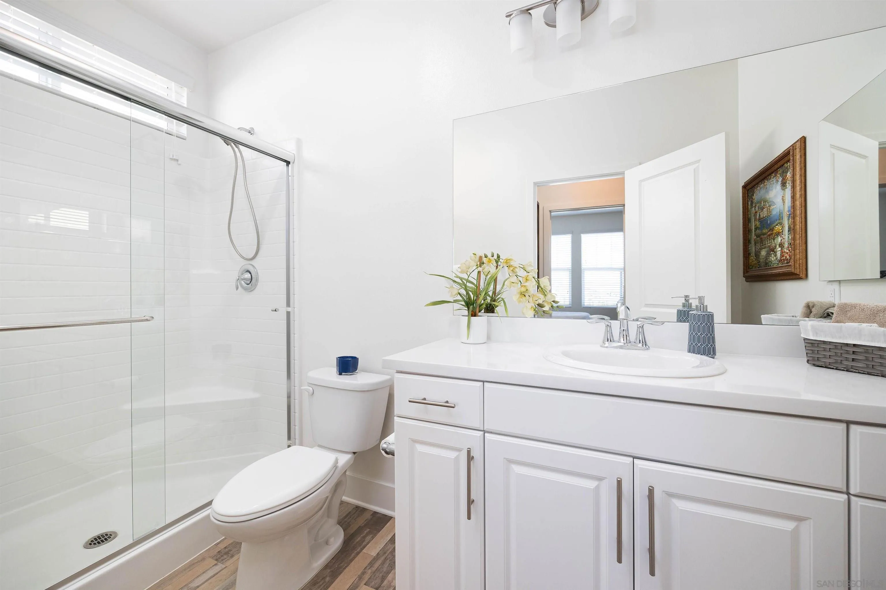 35763 Garrano Lane Fallbrook, CA 92028 - Photo 7 of 25 a bathroom with a sink a toilet and shower
