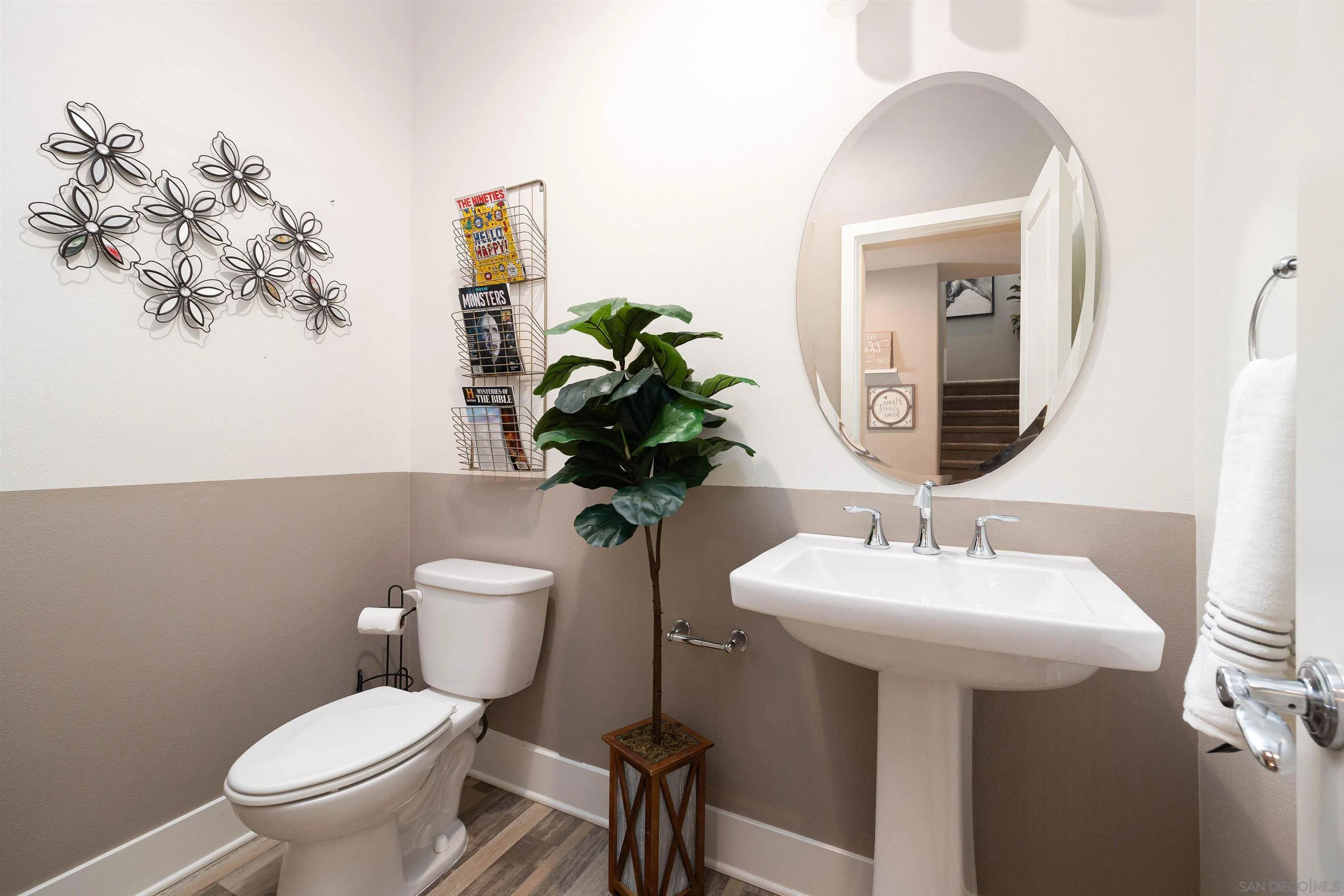 35763 Garrano Lane Fallbrook, CA 92028 - Photo 8 of 25 a bathroom with a toilet sink and mirror