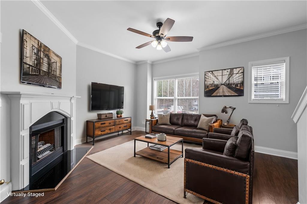 3072 Lauren Parc Road Decatur, GA 30032 - Photo 22 of 36 a living room with furniture a fireplace and a flat screen tv