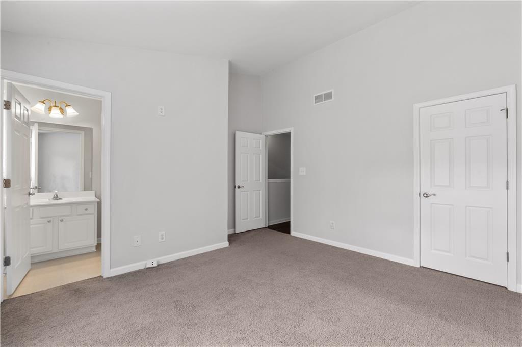 3072 Lauren Parc Road Decatur, GA 30032 - Photo 28 of 36 a view of an empty room with a mirror