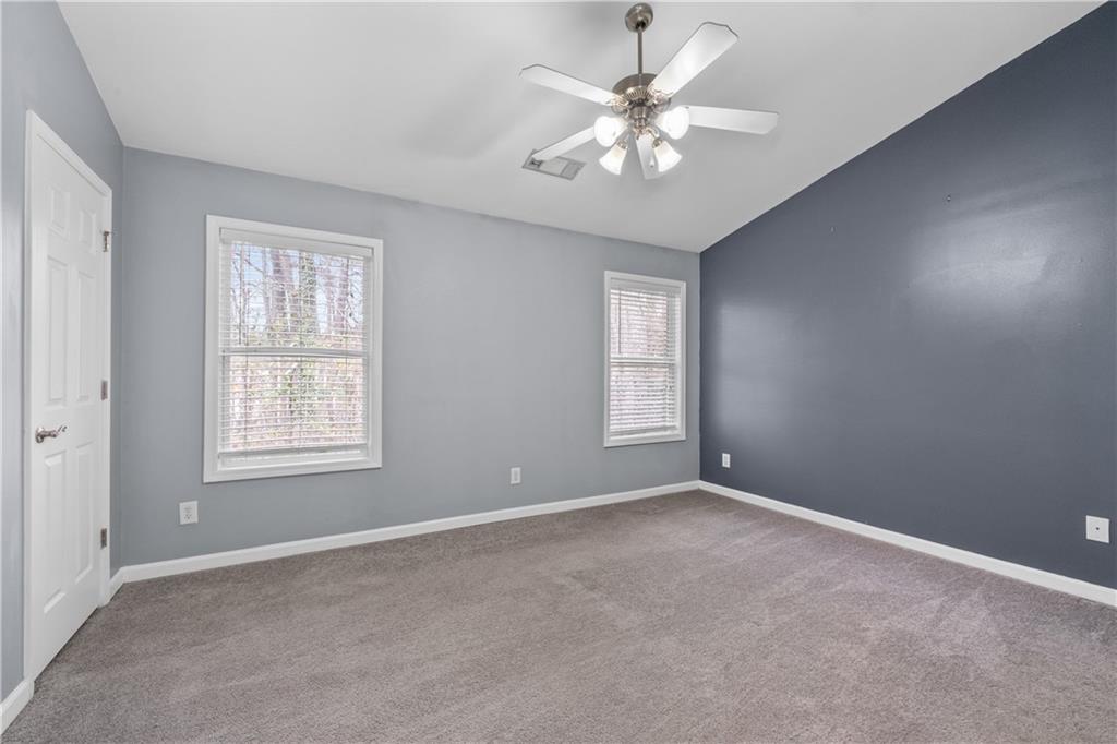 3072 Lauren Parc Road Decatur, GA 30032 - Photo 31 of 36 an empty room with windows and fan