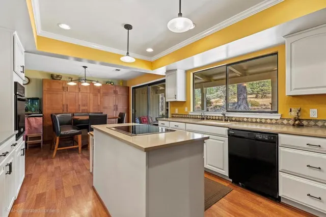 a kitchen with a sink and refrigerator