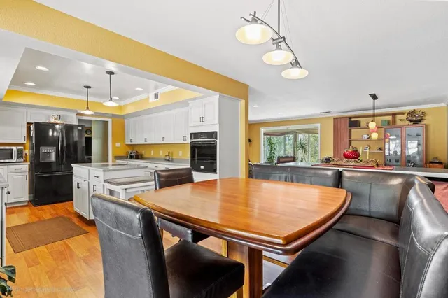 a view of a dining room with furniture