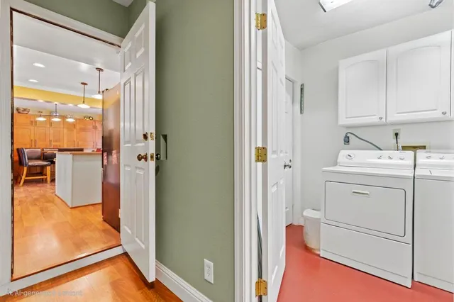 a view of a bathroom with a sink and mirror