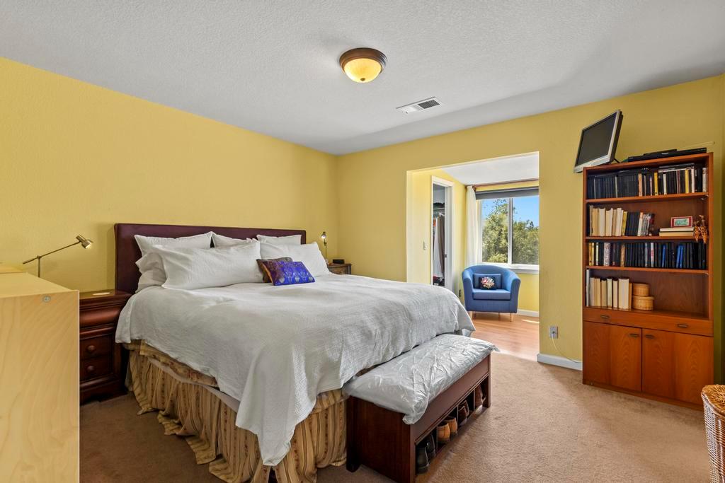 13467 Lake Francis Road Dobbins, CA 95935 - Photo 22 of 54 a bedroom with a bed and a dresser