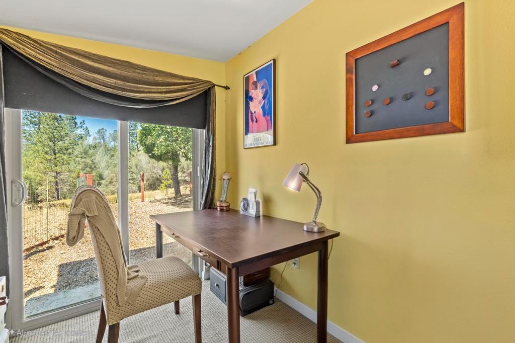 13467 Lake Francis Road Dobbins, CA 95935 - Photo 27 of 54 a view of a dining room with furniture and wooden floor