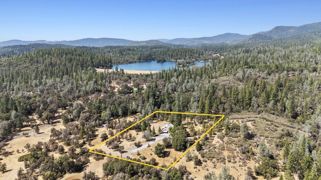 13467 Lake Francis Road Dobbins, CA 95935 - Photo 3 of 54 a view of a forest with a mountain