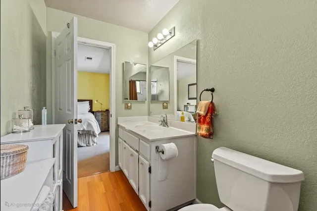 a bedroom with two beds and a window