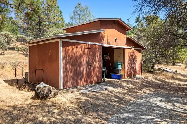 a view of a mountain from a yard