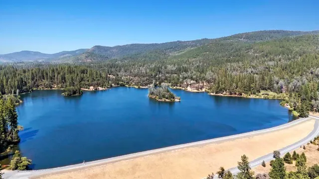 a view of a backyard of a house