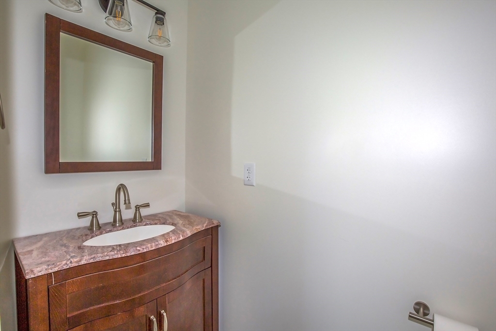 165 Sandisfield Road Sandisfield, MA 01255 - Photo 12 of 37 a bathroom with a sink and a mirror
