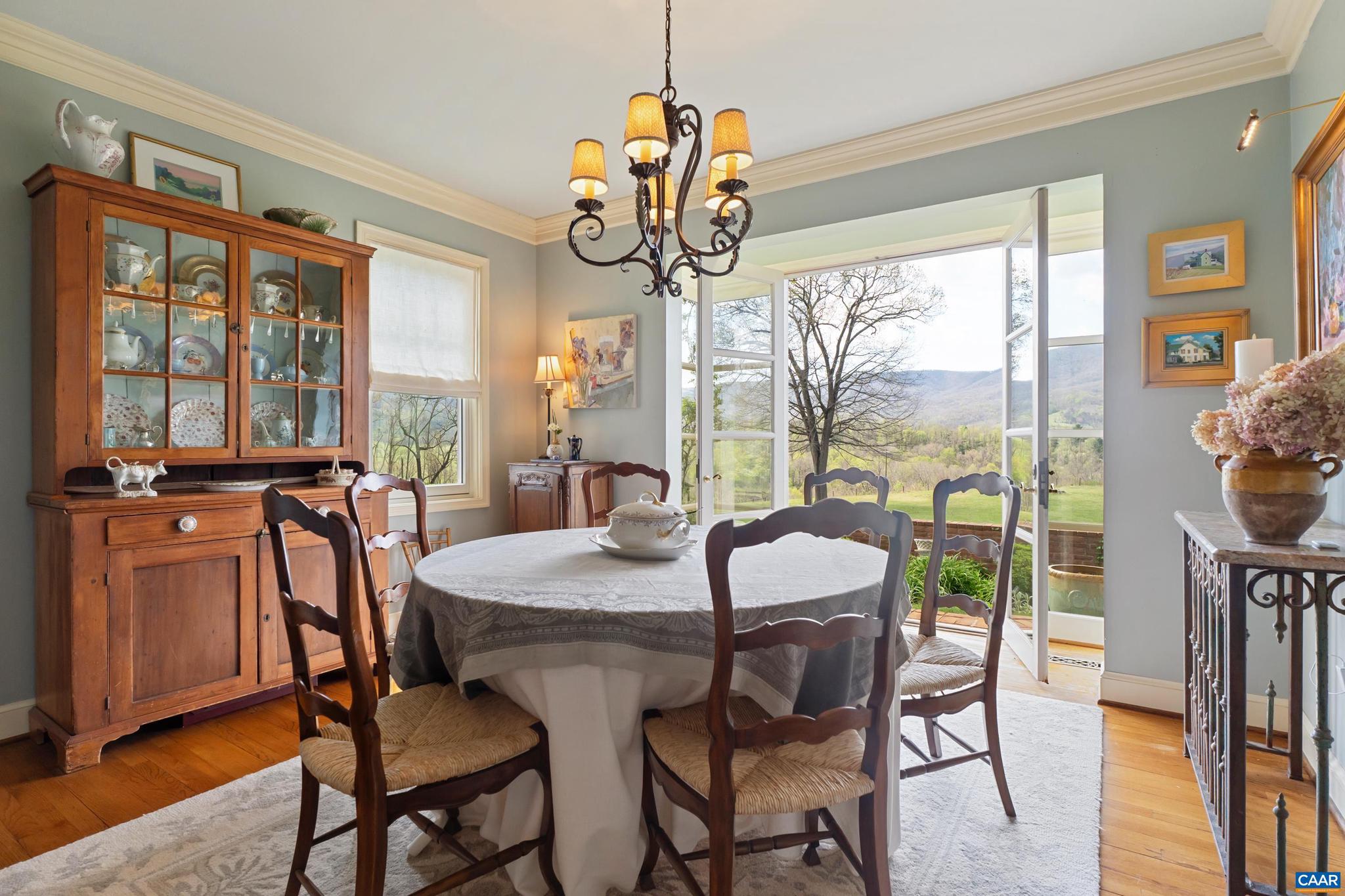 5614 Hot Springs Road Hot Springs, VA 24445 - Photo 11 of 71 a view of a dining room with furniture window and outside view