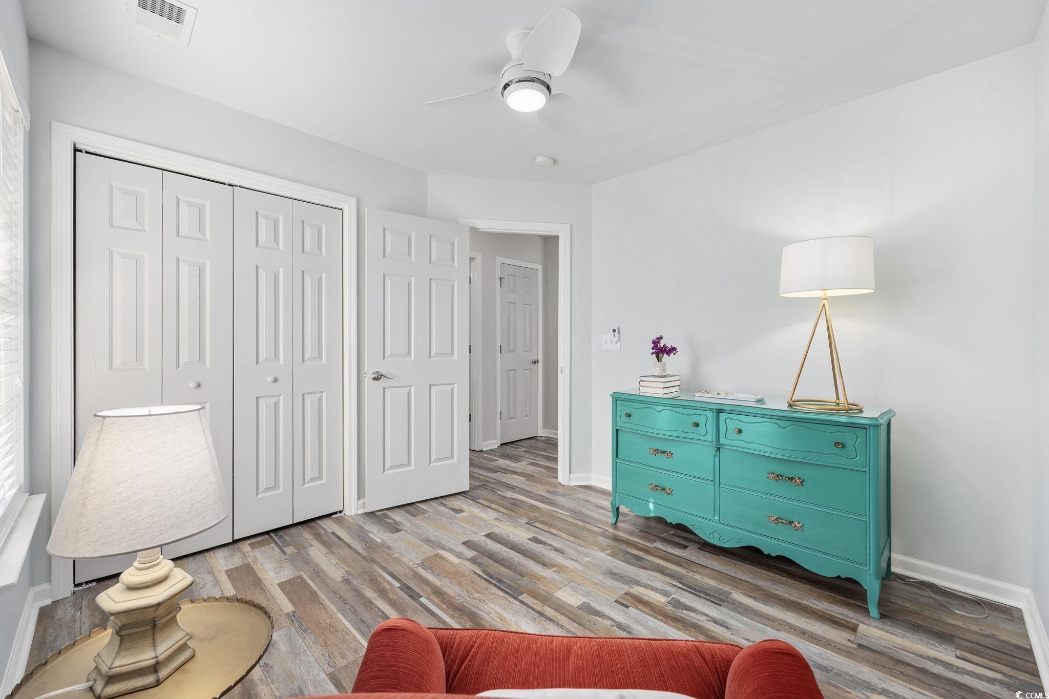4618 Fringetree Drive Murrells Inlet, SC 29576 - Photo 21 of 40 Sitting room featuring light wood-style floors and a ceiling fan