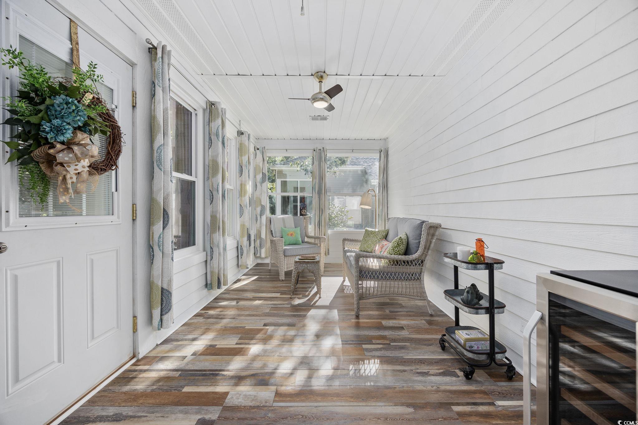 4618 Fringetree Drive Murrells Inlet, SC 29576 - Photo 24 of 40 Sunroom with beverage cooler