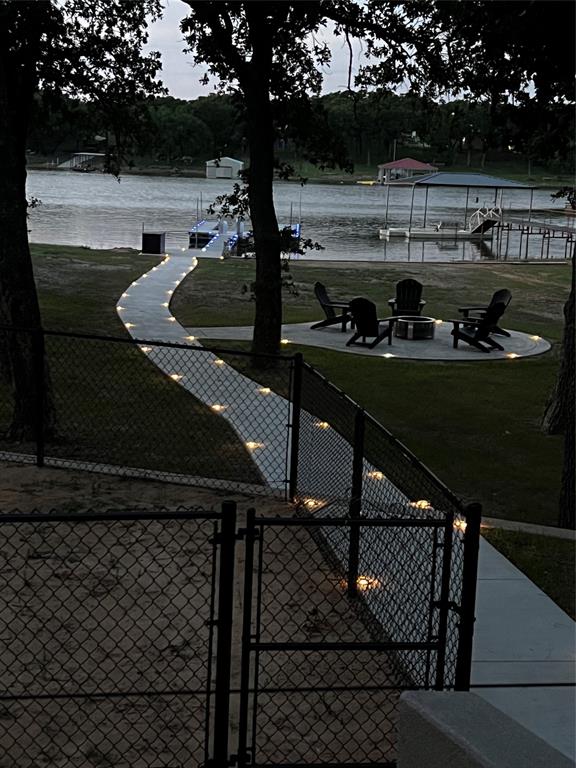 1529 Casino Road Nocona, TX 76255 - Photo 33 of 35 a view of a patio with table and chairs with plants