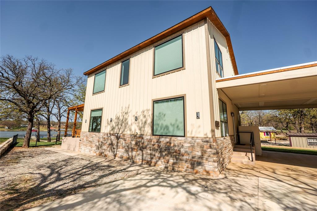 1529 Casino Road Nocona, TX 76255 - Photo 6 of 35 a front view of a house with a yard