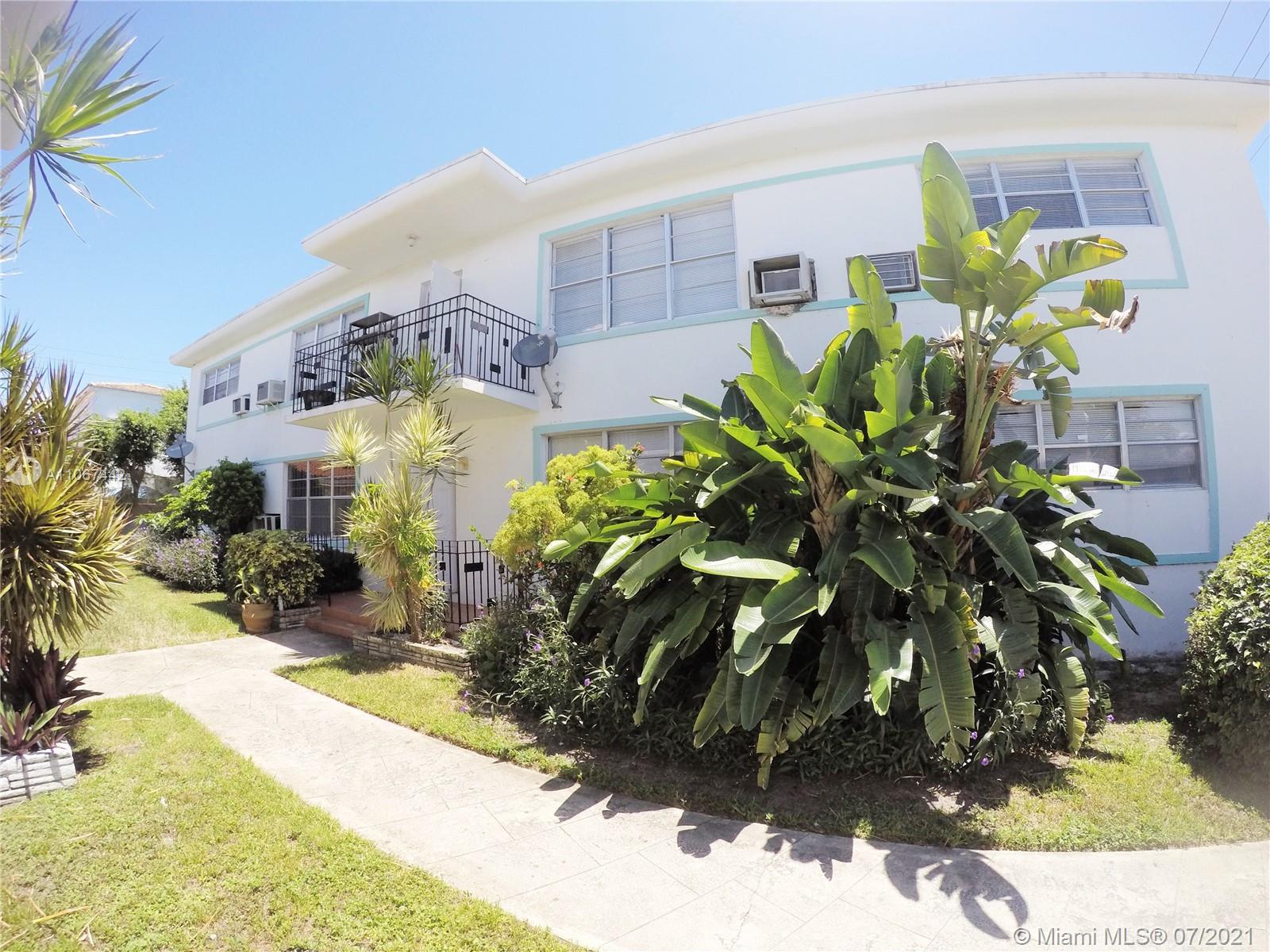 a plant is in front of a house