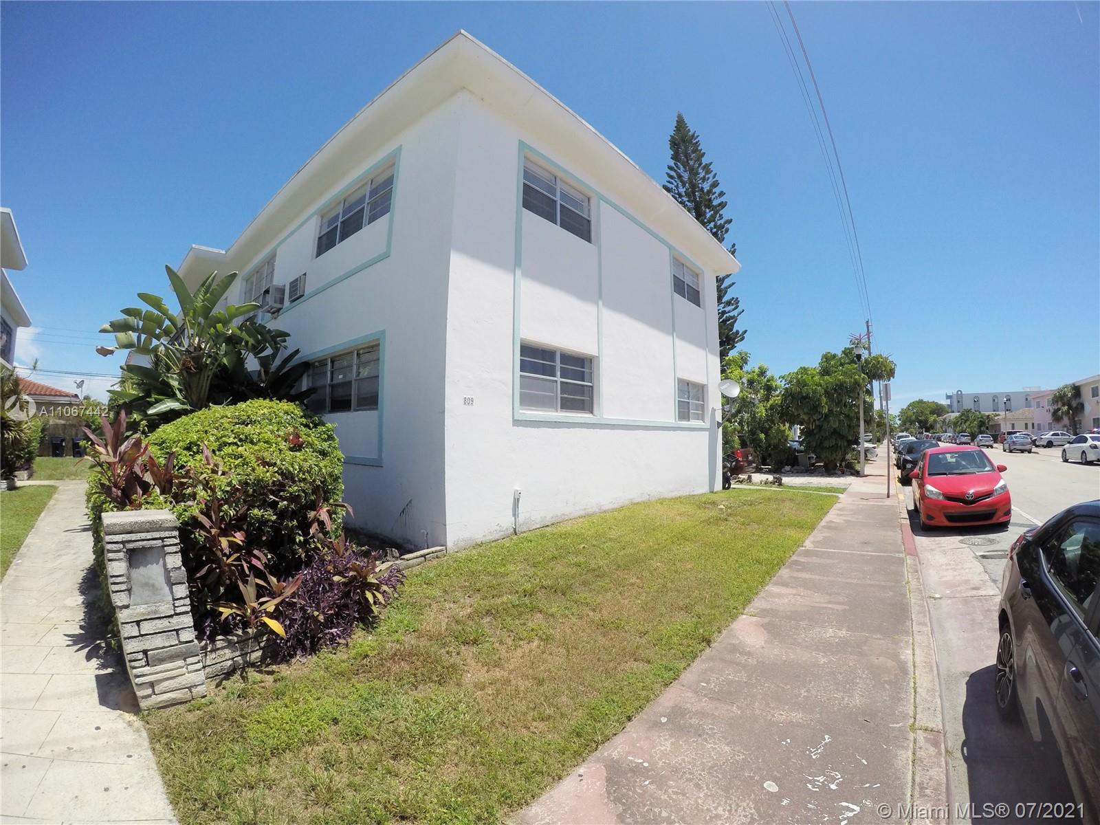 809 85th Street Miami Beach, FL 33141 - Photo 2 of 32 a view of a chair and tables in the patio