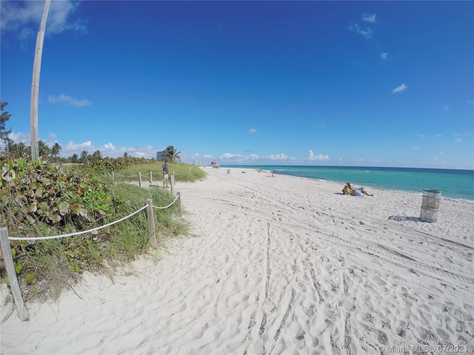 809 85th Street Miami Beach, FL 33141 - Photo 25 of 32 a view of a dry yard with wooden fence