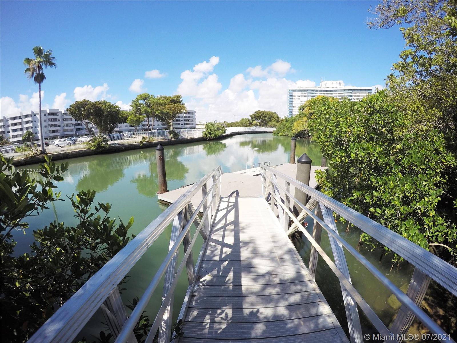 809 85th Street Miami Beach, FL 33141 - Photo 29 of 32 a view of a lake from a balcony