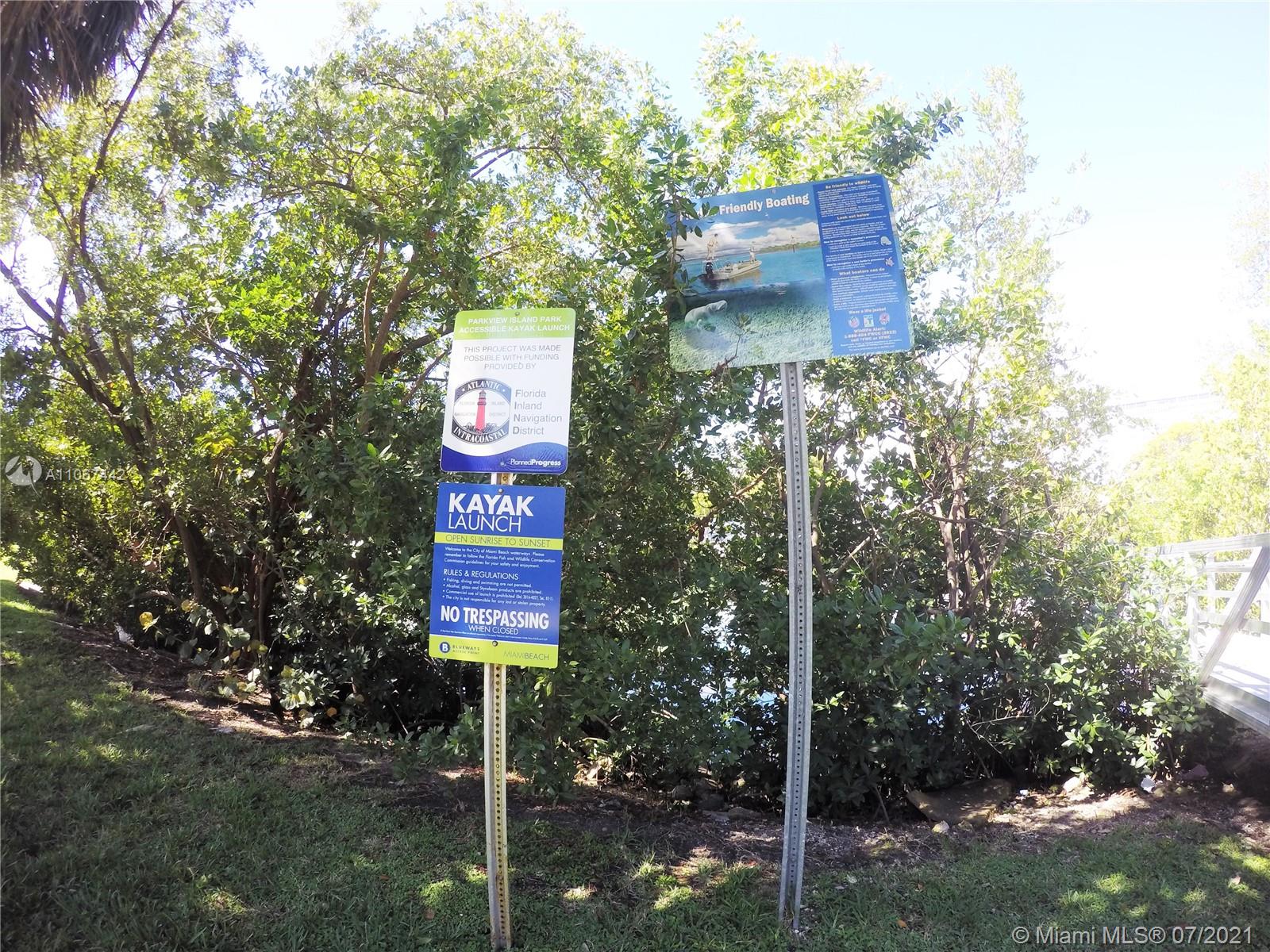 809 85th Street Miami Beach, FL 33141 - Photo 32 of 32 a sign that is sitting on a brick wall