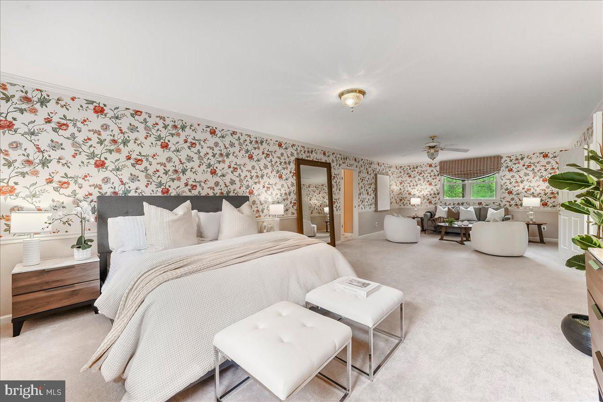 1750 Stocton Road Jenkintown, PA 19046 - Photo 34 of 50 a spacious bedroom with a bed and a couch