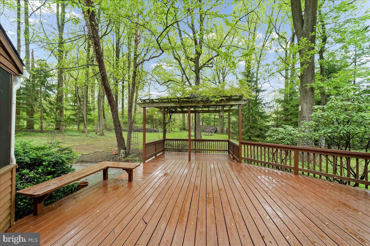 1750 Stocton Road Jenkintown, PA 19046 - Photo 44 of 50 a view of a wooden deck with a yard