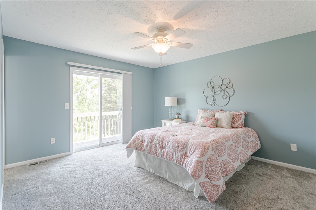 100 Windmill Trail Ogden, NY 14624 - Photo 24 of 36 Owner's Suite with Juliet Balcony and New Sliding