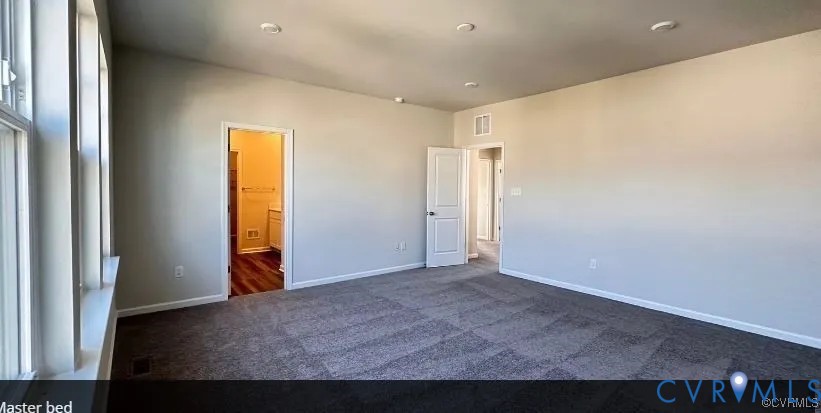 6455 Fennec Run Moseley, VA 23120 - Photo 14 of 18 Unfurnished bedroom featuring dark carpet and conn