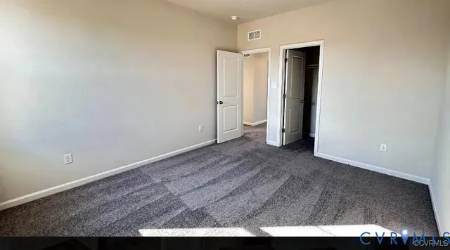 a view of a room with an empty space