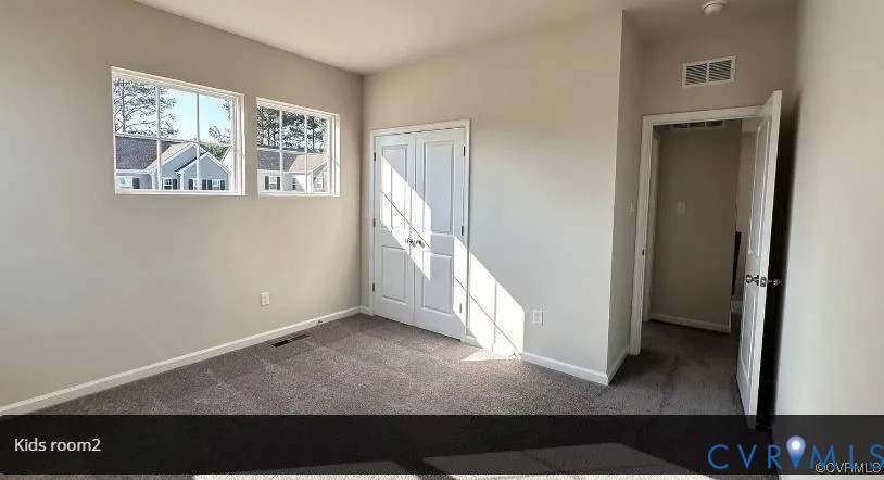 6455 Fennec Run Moseley, VA 23120 - Photo 10 of 18 Foyer with baseboards and carpet