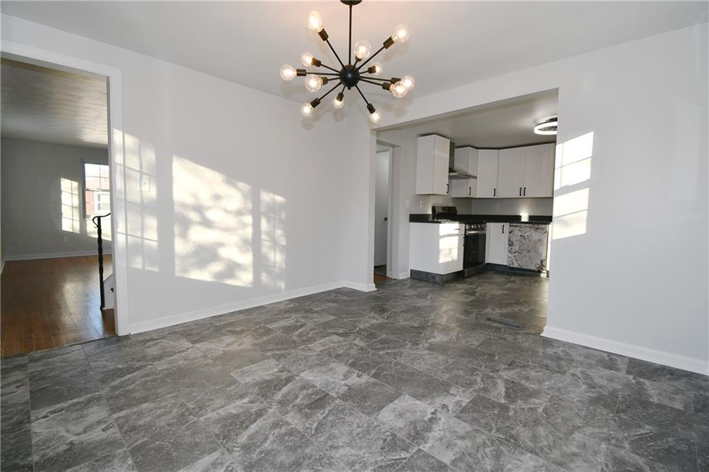 217 Oaklyn Road Bethel Park, PA 15102 - Photo 11 of 42 a view of a kitchen with a sink and a stove top oven