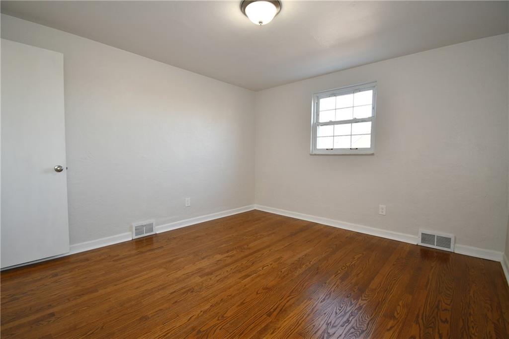 217 Oaklyn Road Bethel Park, PA 15102 - Photo 14 of 42 wooden floor in an empty room