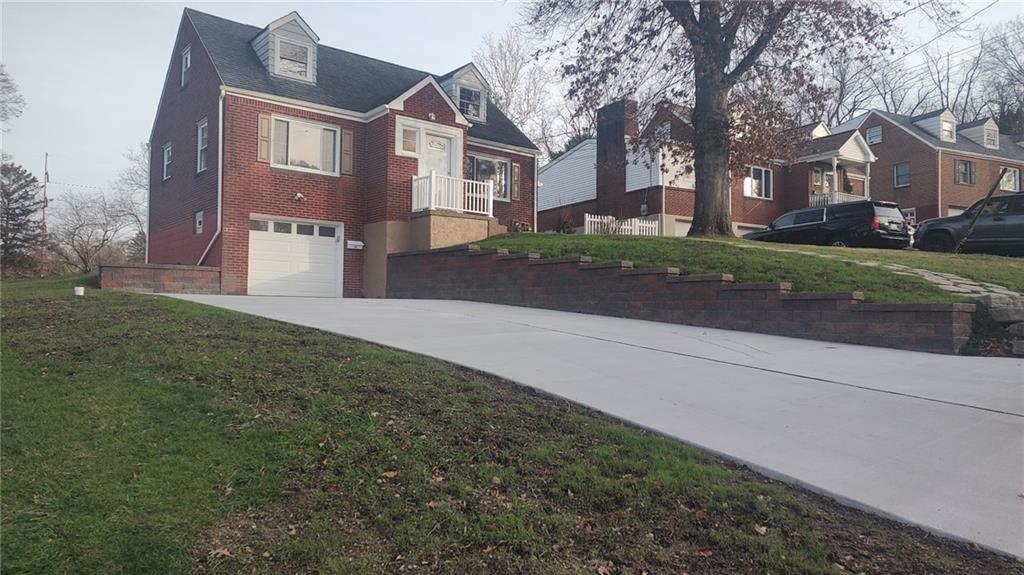 217 Oaklyn Road Bethel Park, PA 15102 - Photo 2 of 42 a view of road with large trees