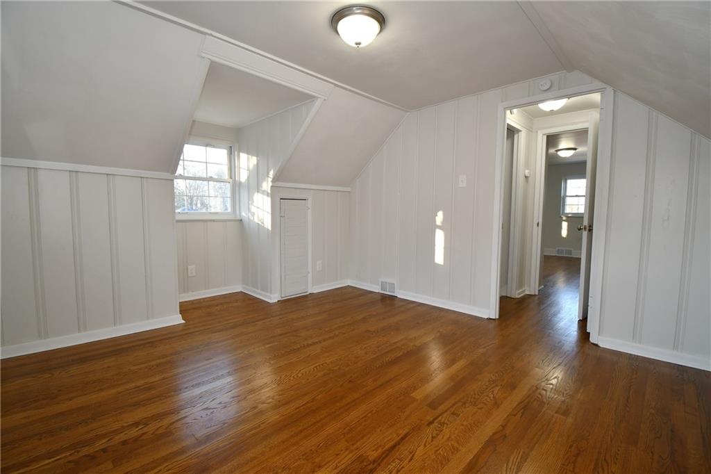 217 Oaklyn Road Bethel Park, PA 15102 - Photo 30 of 42 a view of empty room with wooden floor and fan